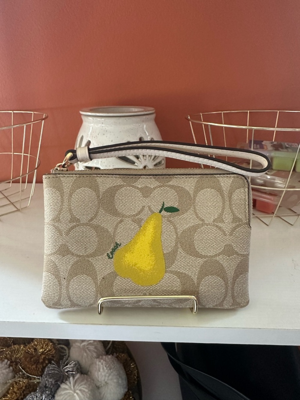 COACH Signature Print Coated Canvas Wristlet with Yellow Pear